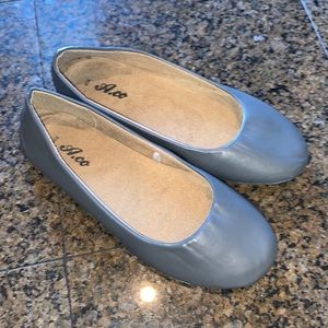 Gray leather flats